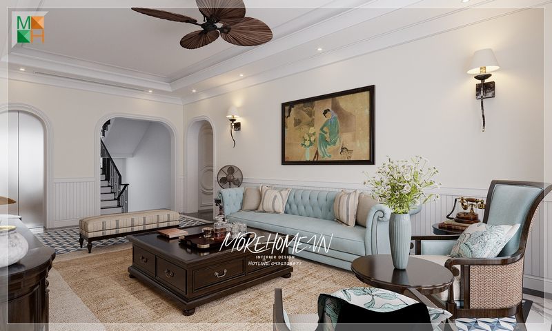 Chiếc bàn trà tối màu được đặt ở vị trí trung tâm giúp không gian phòng khách trở nên tiện nghi và ấn tượng hơn.